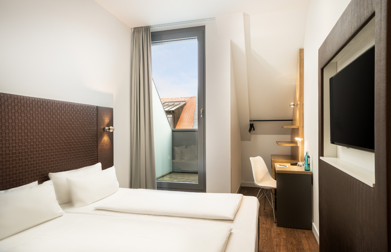 elaya-hotel-leipzig-city-center-superior-doppelzimmer-doppelbett Gemütlich ist es in einem superior doppelzimmer im elaya hotel leipzig city center