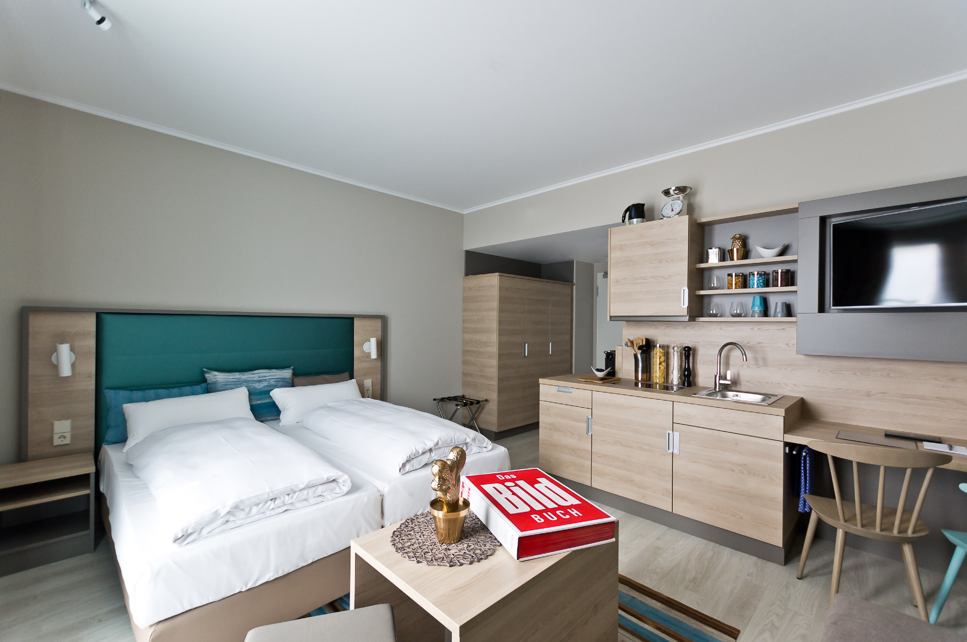 elaya-hotel-stuttgart-boeblingen-apartment-doppelbett Großes Doppelbett in den Apartments im elaya hotel stuttgart boeblingen